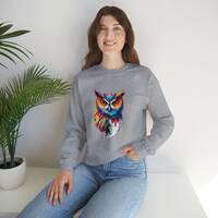 Striking colorful owl unisex sweatshirt - the perfect gift for any lover of Owls