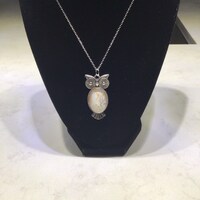 Owl pendant on a silver chain