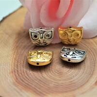 Perles hiboux en m&eacute;tal 15*11 mm par 2