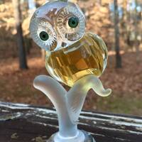 Crystal owl on tree branch figurine. vintage amber and clear cut glass  owl with green eyes sitting 