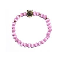 Stretch bracelet with pink cats eye gemstone beads and antique gold owl spacer bead. (Silver or gold