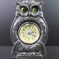 Art Nouveau Antique owl clock with shifty eyes that move with time.