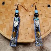 The pewter antique silver wise Ole Owl shaped charms Metal mounted on denim fabric earrings with bot