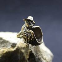 Owl jewelry ring. Forest owl on finger ring. Bird figure owl with big eyes. Wild nature wisdom bird 