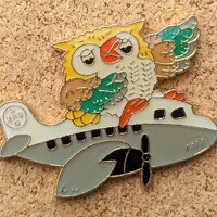 Vintage Owl riding an airplane enamel pin