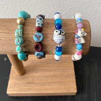 Boho Animal Bracelets with a Songbird, Owl, or Unicorn, a stretchy handmade bracelet with a gift bag