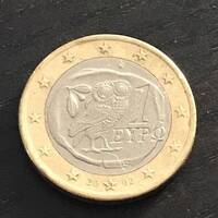 Pièce 1 euros 2002 hibou lettre S gravée dans l'étoile erreur centrage du O