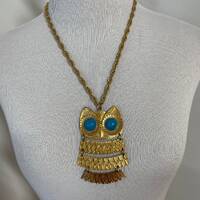 Vintage 60s gold articulated owl with turquoise cabochon eyes