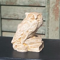 Carved Soapstone Owl Sitting on Books