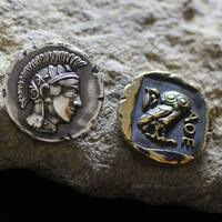 Old-style tetradrachm coin of Athens. Athenian owl design coin. REPLICA. Athena and owl Ancient Gree