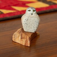 Hand-painted Snowy Owl carved of Aspen and mounted on heart wood, measures about 2.75 inches high
