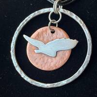 Handmade Owl and Moon Sterling Silver and Copper Pendant, hung from a long double cord