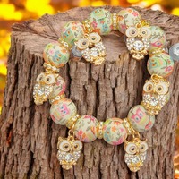 Owl Charm Bracelet with Bling Owls. D15-103