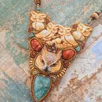 The owl totem necklace.