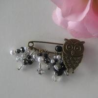 Owl brooch with black and white beads, pearls and crystals
