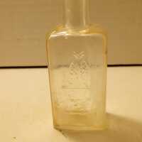 1890's Owl Drug Co One Wing Owl 4 inch tall Horseshoe shaped Perfume Fragrance Scent medicine dr