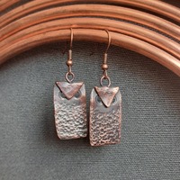 Small copper owls for your ear. Handforged, natural patinated, ultralight.