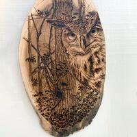 Wood burned Horned Owl in the Forest