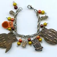 Owl Charm Bracelet Made With Flea Market Treasures and two tin owls