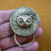 small owl head on spiral swirl starburst textured round brass Eyeglass holder id badge pin pendant l