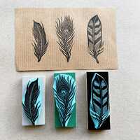 Feather rubber stamps of a bird, peacock and owl