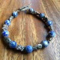 Blue & Silver Owls, beaded bracelet, denim color with silver accents.