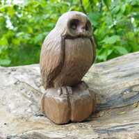 Owl statue. Handmade wooden owl figurine. Wood carving.