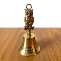 A stylish Victorian owl brass hand bell, in good condition, stamped inside