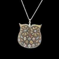 large owl necklace made with wood, resin, glass