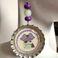 Pirate Owl Dangle Earrings With Silver Bottlecap with A Pirate Owl and Green and Purple Beads
