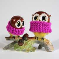 pink scarf owls on branch with acorns