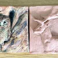 Owl and deer figures made of clay