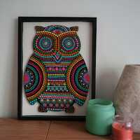 Handcrafted owl dot art in an open shadow box frame