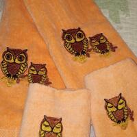Vintage 1970s Martex Owl bathroom hand towels and wash cloths. Bright hippie orange !
