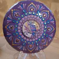 Owl mandala on an art stone with glass crystals