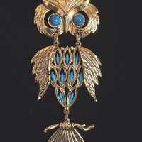 Articulated Owl Necklace. 4.5" pendant 28" Goldtone chain.