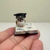 The Scholarly Owl: Hand-Painted Ceramic Miniature on Open Book