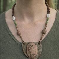 Ceramic owl and crystal necklace.