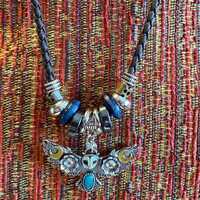 Beautiful Metal Owl Pendant with Inlaid Golden Moons, Turquoise Stone and Iridescent Bead Flowers on