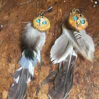 Ceramic owl earrings with found beach feathers