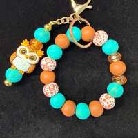 Beaded owl wristlet