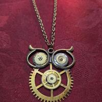 Bronze owl made from different clock parts