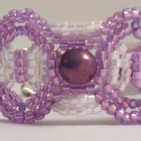 Purple & White Beaded Bracelet: Saturn Connections, Owl Clasp