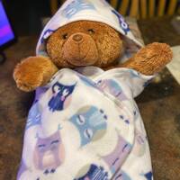 Owl hooded fleece swaddle.