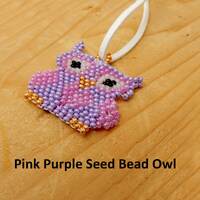 Pink and Purple Owl Pendant. Pink and purple seed beads woven into an owl on white leather. Gift for