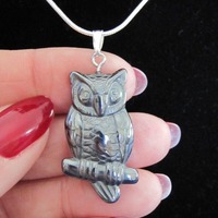 Striking carved Hematite Owl pendant with free 18 inch 925 stamped silver snake chain. Great Unisex 