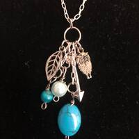 Boho charm necklace with owl, leaf and arrow