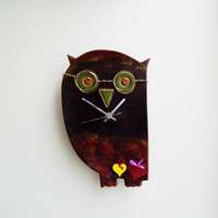 Black owl clock, ceramic wall clock of owl with black head and dark coloured body, ceramic owl clock